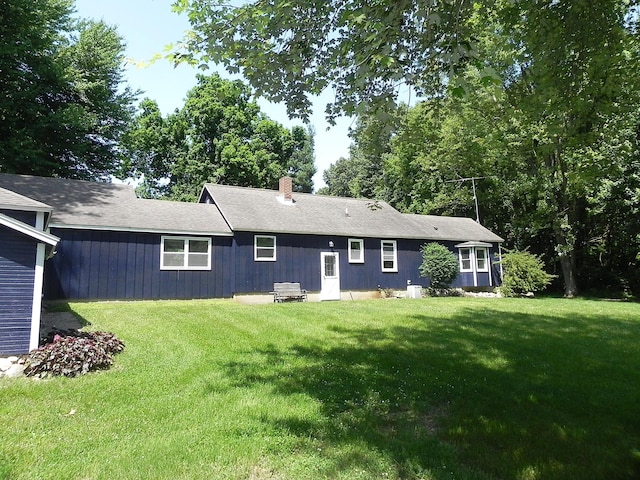 27869 M-60, Mendon, MI 49072 - rear view of house featuring a lawn and a chimney
