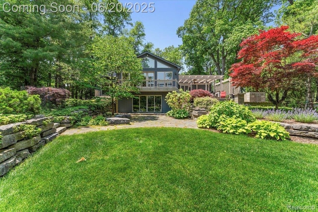 21089 Thorofare Rd, Grosse Ile, MI 48138 - view of green lawn featuring a pergola and a wooden deck