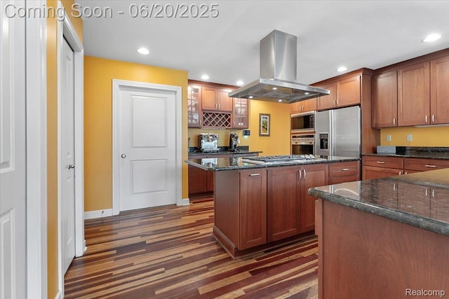 21089 Thorofare Rd, Grosse Ile, MI 48138 - kitchen featuring island exhaust hood, appliances with stainless steel finishes, recessed lighting, dark wood-type flooring, and a kitchen island