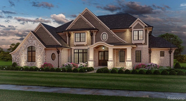 0001 Woodlynne Dr, Bingham Farms, MI 48025 - view of front facade featuring a front lawn, stone siding, brick siding, and a shingled roof