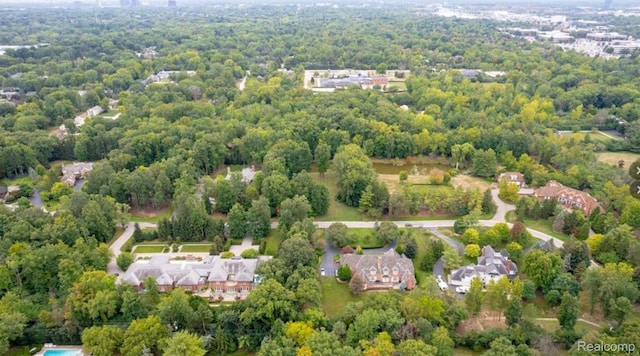 0001 Woodlynne Dr, Bingham Farms, MI 48025 - aerial overview of property's location with a heavily wooded area