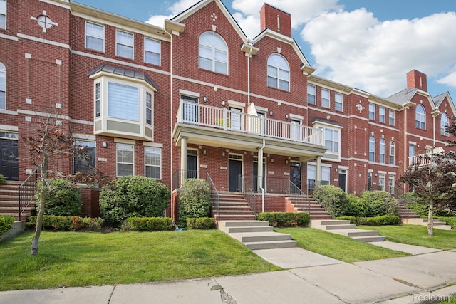 3207 Camden Dr Unit 110, Troy, MI 48084 - multi unit property featuring brick siding and a front yard