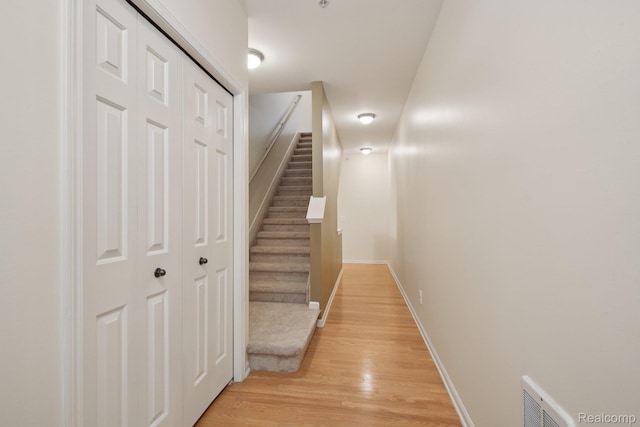 3207 Camden Dr Unit 110, Troy, MI 48084 - staircase featuring wood finished floors and baseboards