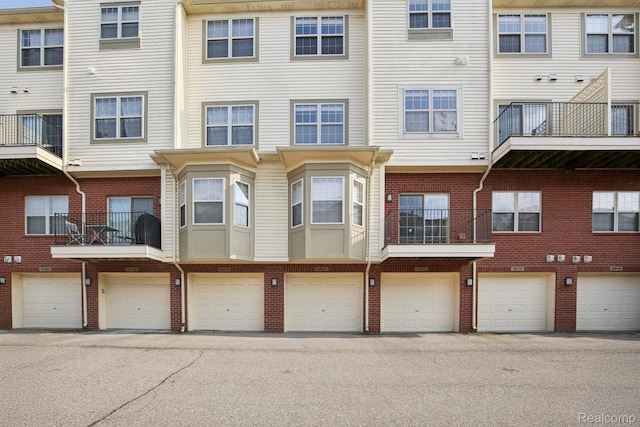 3207 Camden Dr Unit 110, Troy, MI 48084 - view of building exterior with an attached garage