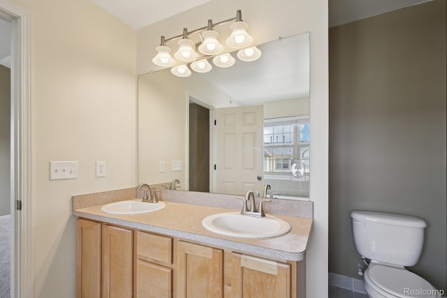 3207 Camden Dr Unit 110, Troy, MI 48084 - bathroom with toilet and double vanity