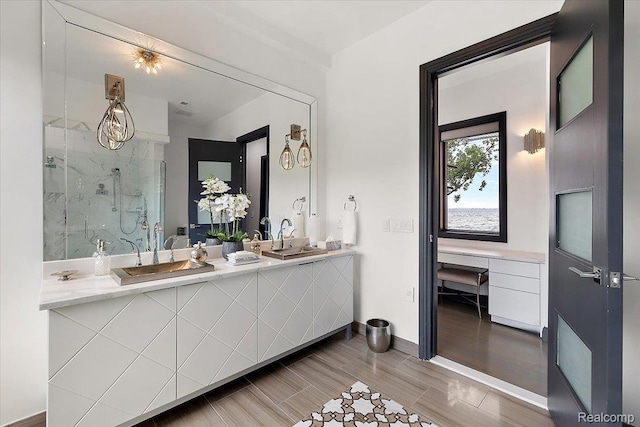 8349 Dixie Hwy, Ira, MI 48023 - full bathroom with double vanity, a marble finish shower, and wood finished floors