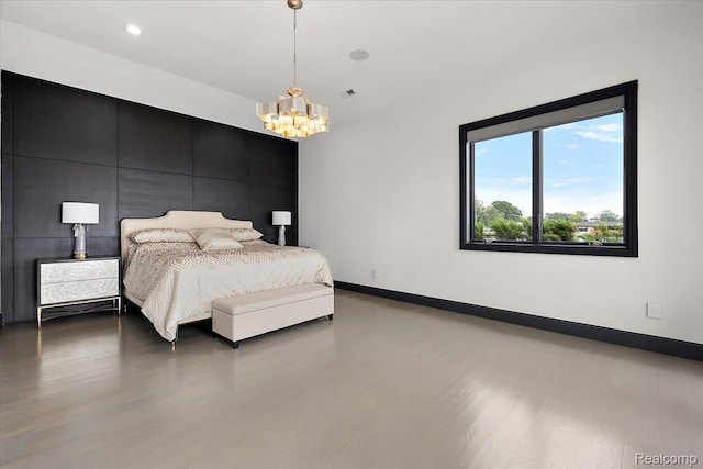 8349 Dixie Hwy, Ira, MI 48023 - bedroom featuring wood finished floors and a chandelier