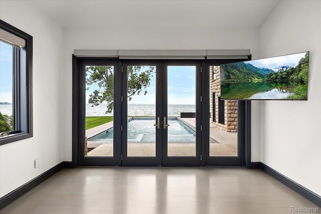 8349 Dixie Hwy, Ira, MI 48023 - doorway with a water view, healthy amount of natural light, and french doors