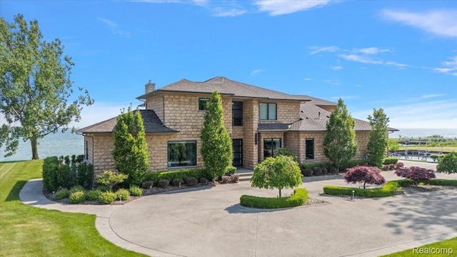 8349 Dixie Hwy, Ira, MI 48023 - traditional-style house featuring a chimney and stone siding
