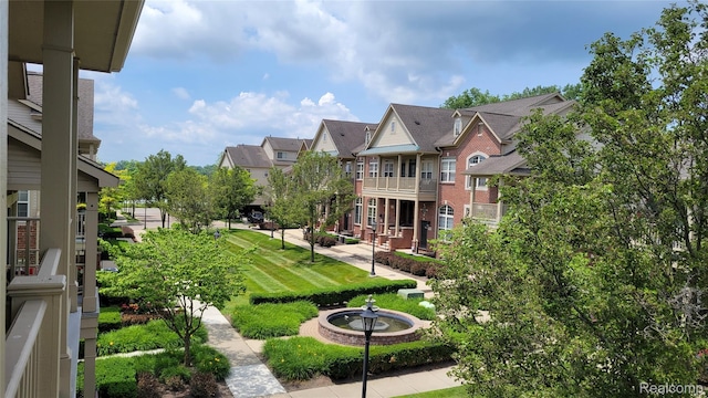 157 E Bay Dr, Walled Lake, MI 48390 - view of community with a residential view and a yard