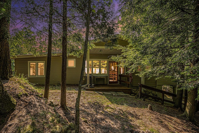 8641 N Perry Ave, Pentwater, MI 49449 - rear view of house with a porch