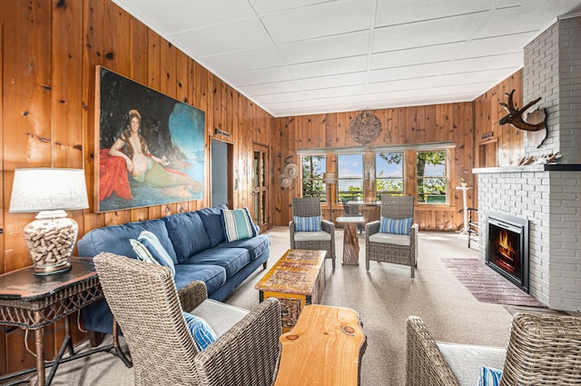 8641 N Perry Ave, Pentwater, MI 49449 - living room with wooden walls and a fireplace