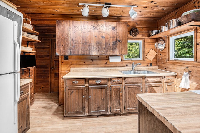 8641 N Perry Ave, Pentwater, MI 49449 - kitchen featuring freestanding refrigerator, open shelves, wooden ceiling, light wood finished floors, and light countertops
