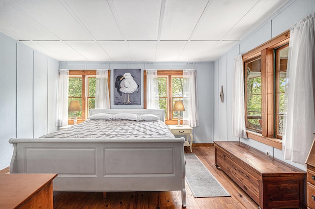 8641 N Perry Ave, Pentwater, MI 49449 - bedroom with hardwood / wood-style flooring