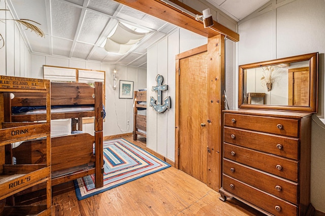 8641 N Perry Ave, Pentwater, MI 49449 - bedroom featuring wood finished floors