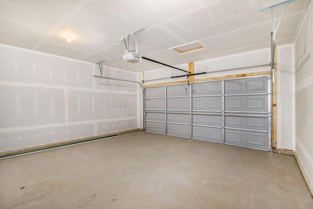 5698 Landrum Trl, Portage, MI 49024 - garage featuring a garage door opener