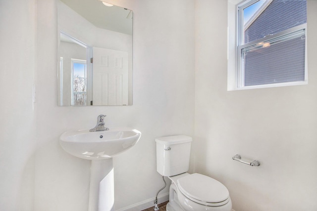 5698 Landrum Trl, Portage, MI 49024 - bathroom with toilet and baseboards