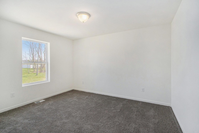 5698 Landrum Trl, Portage, MI 49024 - unfurnished room with dark colored carpet