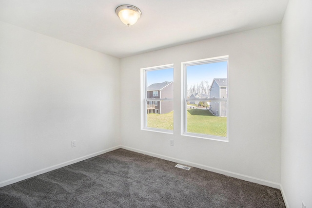 5698 Landrum Trl, Portage, MI 49024 - spare room with dark carpet