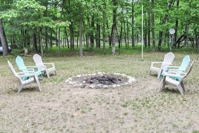 9210/9228 S Star Lake Dr, Baldwin, MI 49304 - view of yard featuring an outdoor fire pit