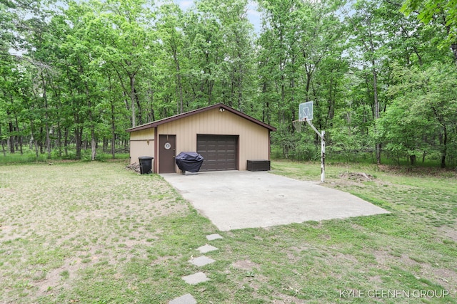 9210/9228 S Star Lake Dr, Baldwin, MI 49304 - detached garage with driveway