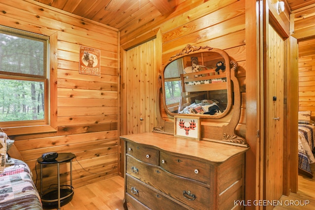 9210/9228 S Star Lake Dr, Baldwin, MI 49304 - bedroom featuring wood walls, wood finished floors, and wood ceiling