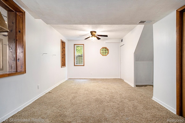 332 Community Dr, Battle Creek, MI 49014 - carpeted spare room with ceiling fan and a textured ceiling