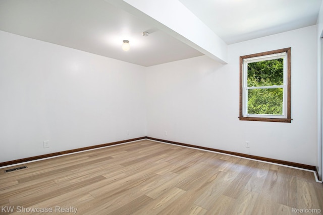 332 Community Dr, Battle Creek, MI 49014 - unfurnished room with light wood-style flooring and baseboards