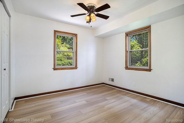 332 Community Dr, Battle Creek, MI 49014 - spare room with light wood-style flooring and a ceiling fan