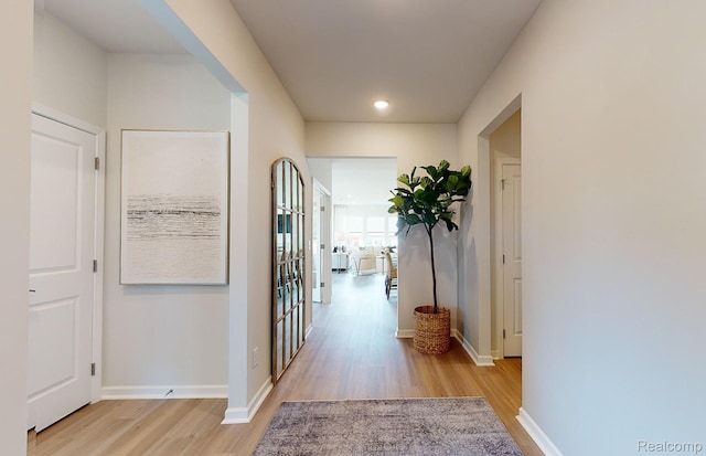 50260 Cromwell St, Canton, MI 48188 - hallway with light wood finished floors and recessed lighting