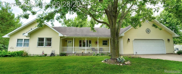 11852 Rathbun Rd, Birch Run, MI 48415 - single story home with covered porch, a garage, concrete driveway, and a front yard