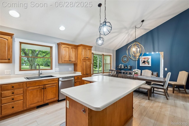 11852 Rathbun Rd, Birch Run, MI 48415 - kitchen featuring stainless steel dishwasher, a kitchen island, light countertops, brown cabinetry, and lofted ceiling