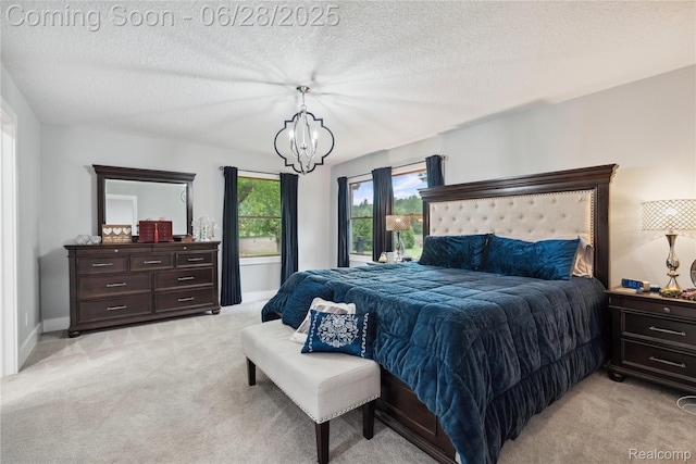 11852 Rathbun Rd, Birch Run, MI 48415 - bedroom with light carpet, a chandelier, and a textured ceiling