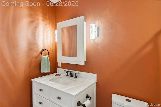 11852 Rathbun Rd, Birch Run, MI 48415 - half bath featuring vanity and toilet