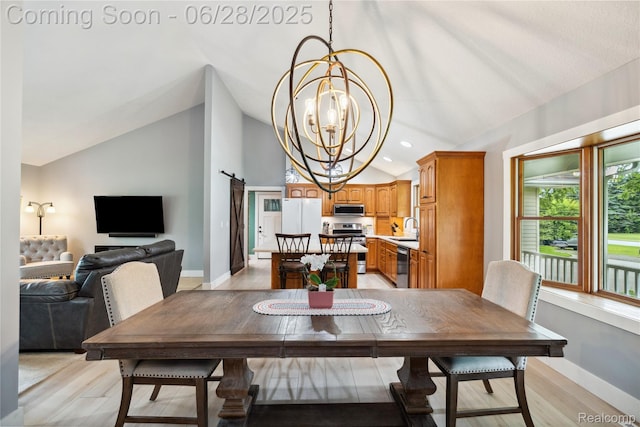 11852 Rathbun Rd, Birch Run, MI 48415 - dining room featuring vaulted ceiling, a chandelier, light wood finished floors, and recessed lighting