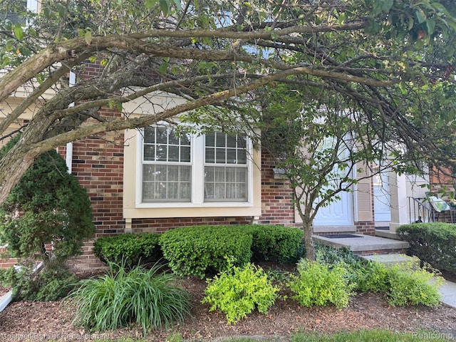 5378 Breeze Hill Pl Apt 32, Troy, MI 48098 - view of property exterior with brick siding