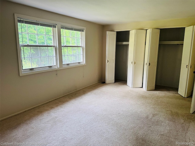 5378 Breeze Hill Pl Apt 32, Troy, MI 48098 - unfurnished bedroom featuring light carpet