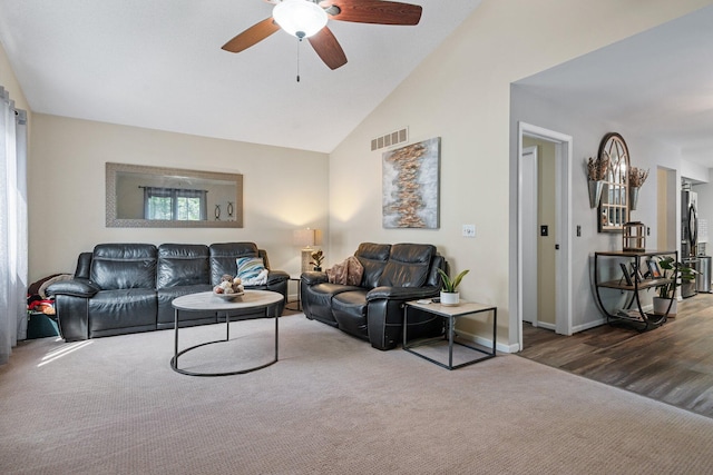 2062 Wildwood Trl, Saline, MI 48176 - living room with ceiling fan, carpet flooring, and high vaulted ceiling