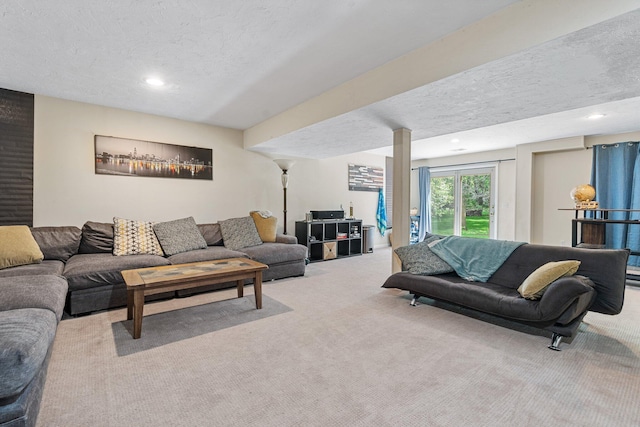 2062 Wildwood Trl, Saline, MI 48176 - carpeted living room with a textured ceiling and recessed lighting