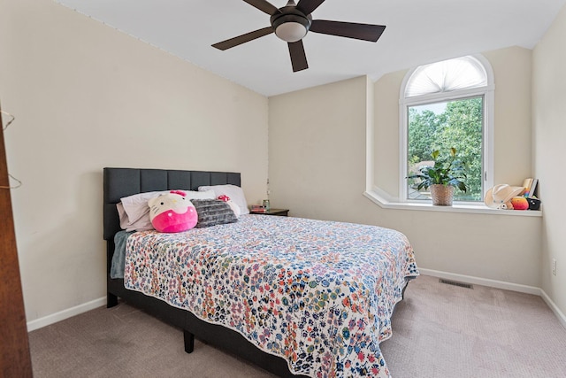 2062 Wildwood Trl, Saline, MI 48176 - carpeted bedroom with baseboards and a ceiling fan