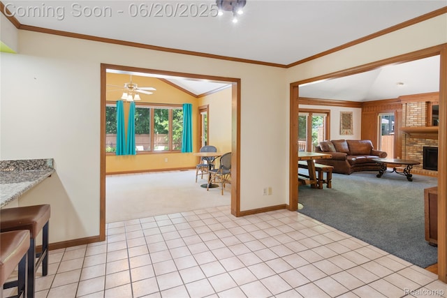 1484 Kings Pointe Rd, Grand Blanc, MI 48439 - living room featuring light colored carpet, a fireplace, a ceiling fan, and crown molding