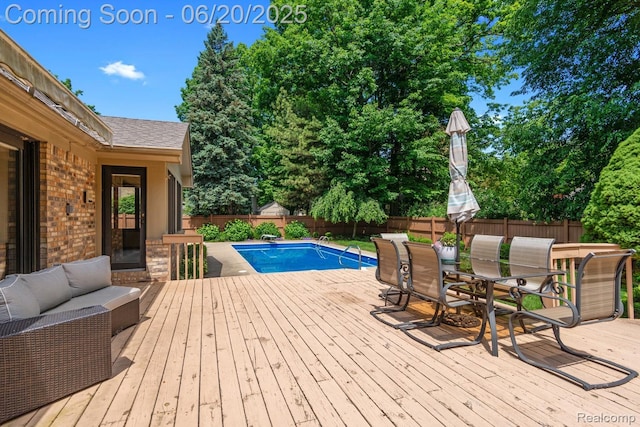 1484 Kings Pointe Rd, Grand Blanc, MI 48439 - wooden deck featuring outdoor lounge area, a fenced backyard, and outdoor dining area