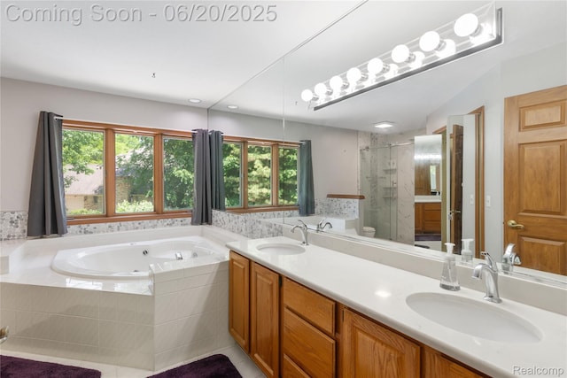 1484 Kings Pointe Rd, Grand Blanc, MI 48439 - bathroom featuring a stall shower, a whirlpool tub, double vanity, and healthy amount of natural light