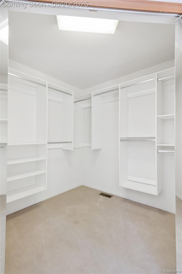 1484 Kings Pointe Rd, Grand Blanc, MI 48439 - spacious closet featuring carpet floors