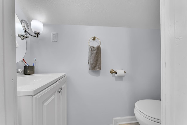 128 E Walnut St, Hastings, MI 49058 - half bath with vanity and a textured ceiling