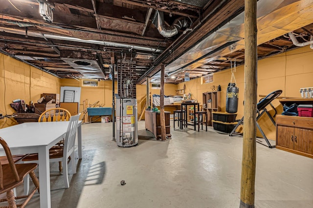 128 E Walnut St, Hastings, MI 49058 - unfinished below grade area with gas water heater and a sink