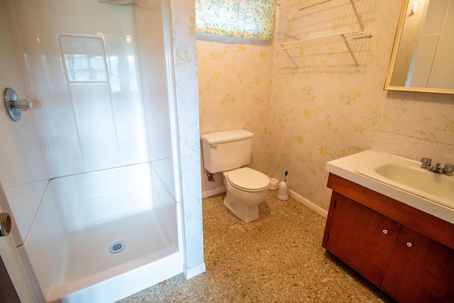 5774 N Wayne Ave, Pentwater, MI 49449 - bathroom with a shower stall, vanity, and wallpapered walls
