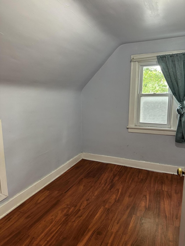 1478 Allen Ave, Muskegon, MI 49442 - additional living space featuring lofted ceiling and dark wood-style floors