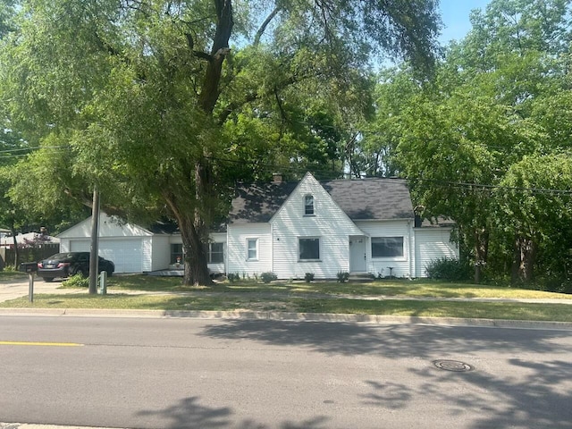 1478 Allen Ave, Muskegon, MI 49442 - view of front of house with a garage and a front yard
