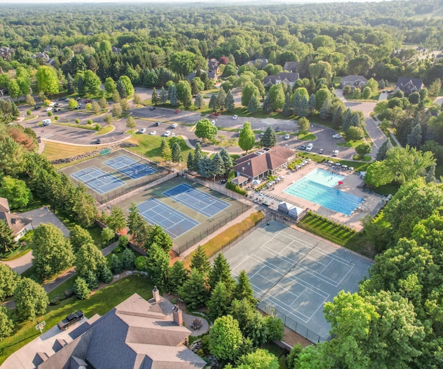 5011 Rockaway Ln, Clarkston, MI 48348 - aerial view of a pool and a heavily wooded area